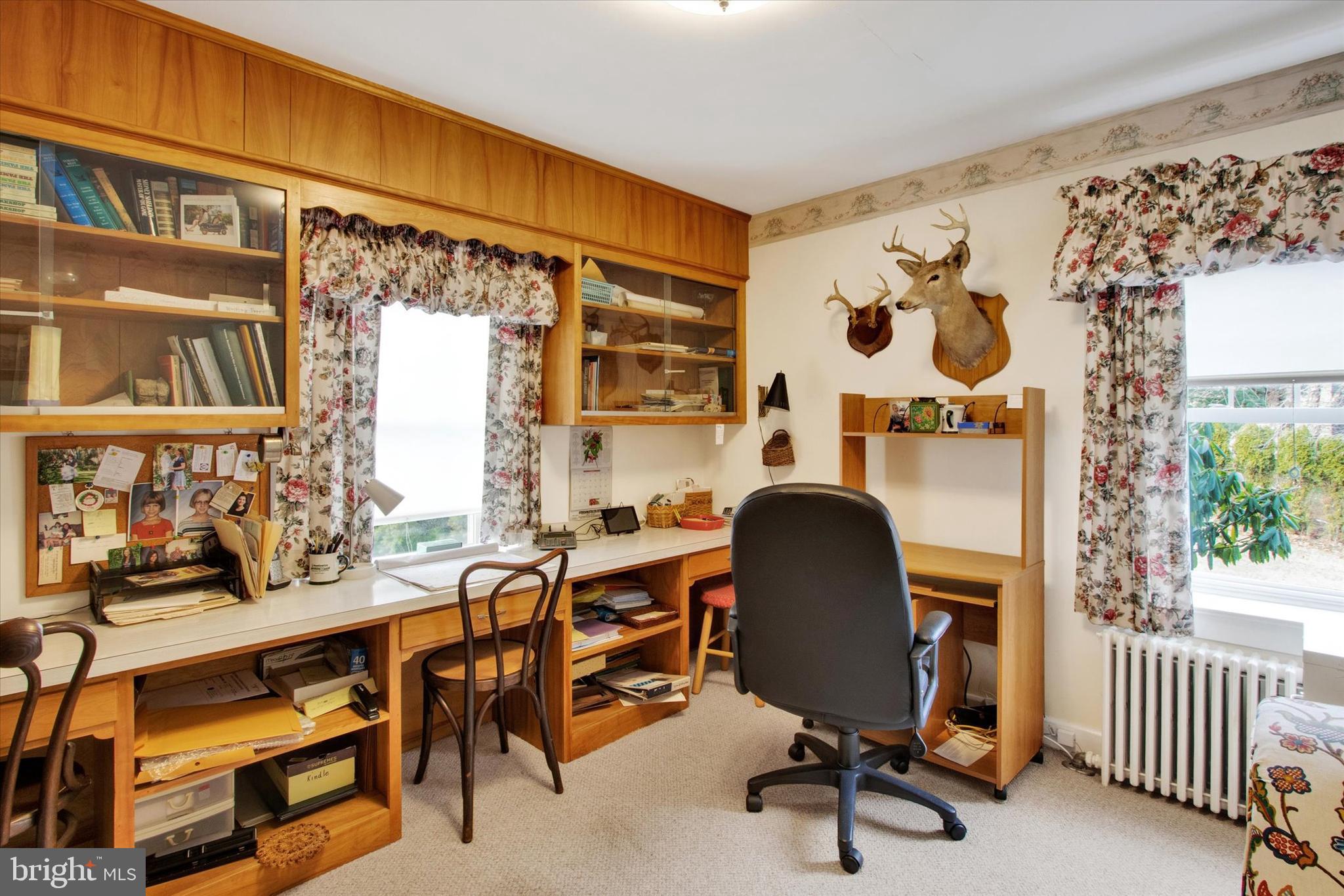 317 Oley Furnace Road Fleetwood, PA 19522 - Photo 19 of 43 a view of a workspace with furniture and a window