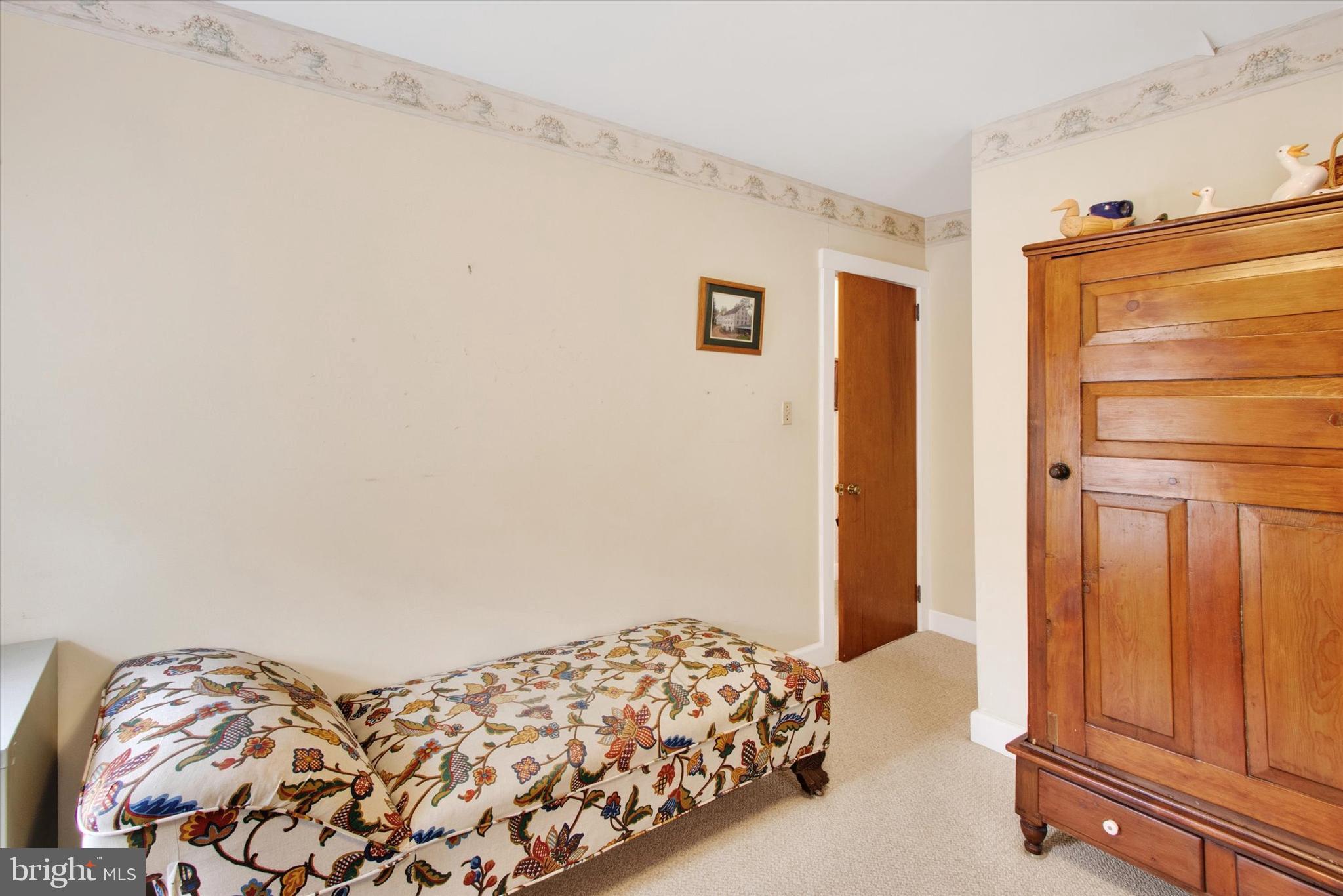317 Oley Furnace Road Fleetwood, PA 19522 - Photo 20 of 43 a bedroom with a bed and wooden floor
