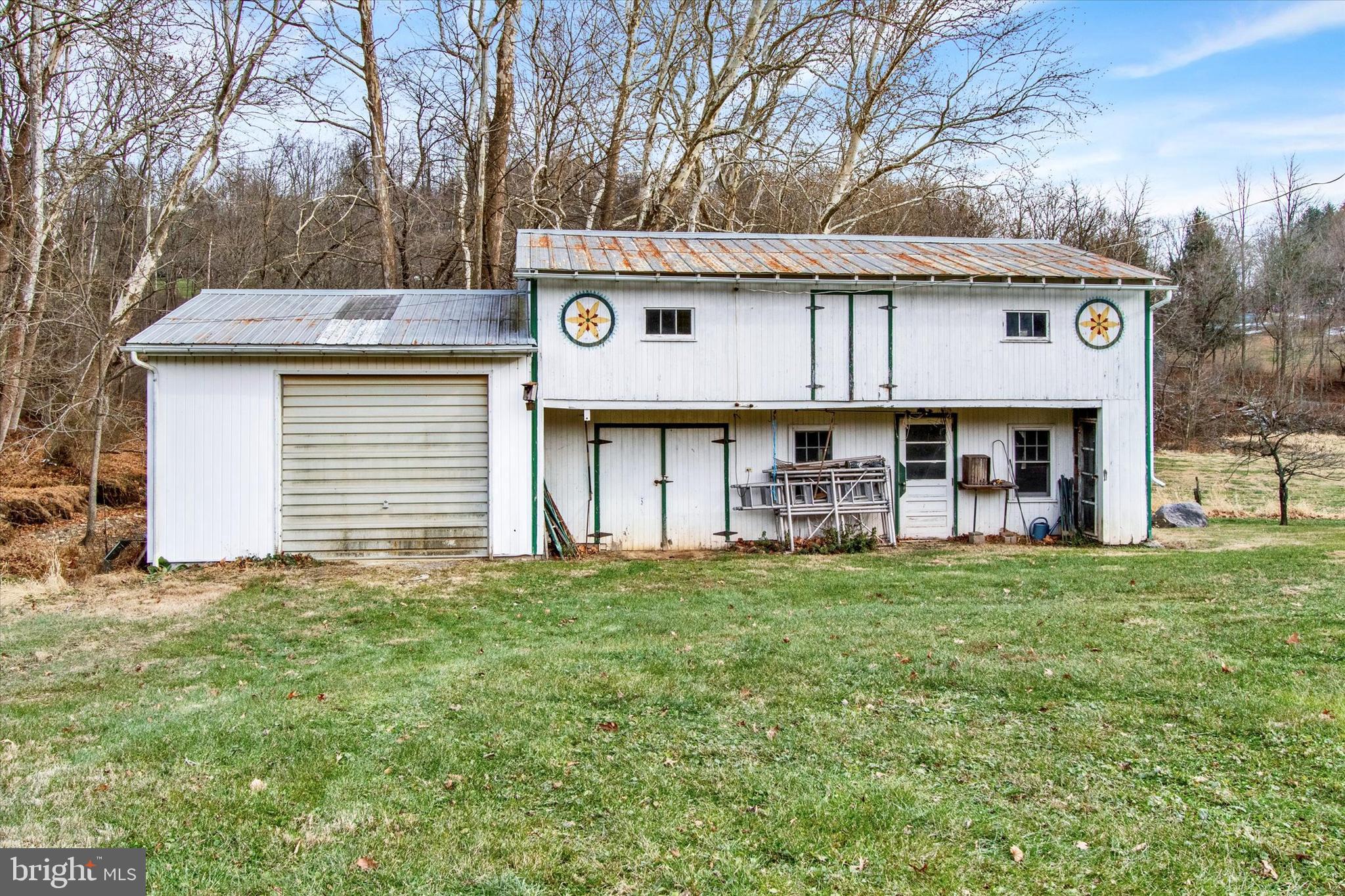 317 Oley Furnace Road Fleetwood, PA 19522 - Photo 38 of 43 a view of a house with a yard and sitting area