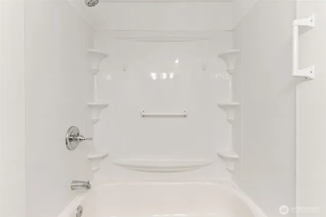 an aerial view of multiple houses with yard