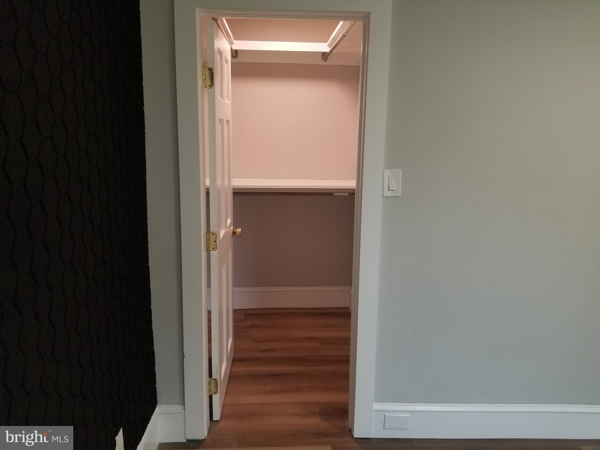 212 Warren Street Beverly, NJ 08010 - Photo 26 of 33 a view of a hallway with wooden floor
