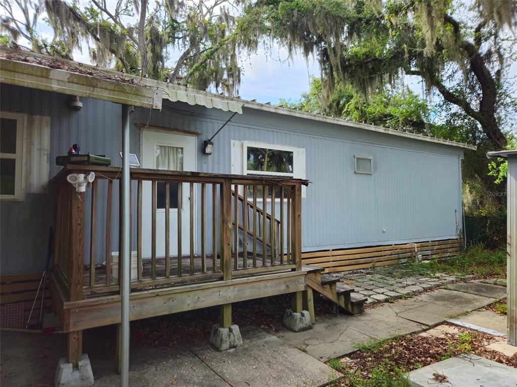 8603 Alafia Ridge Road Riverview, FL 33569 - Photo 2 of 13 a backyard of a house with seating space