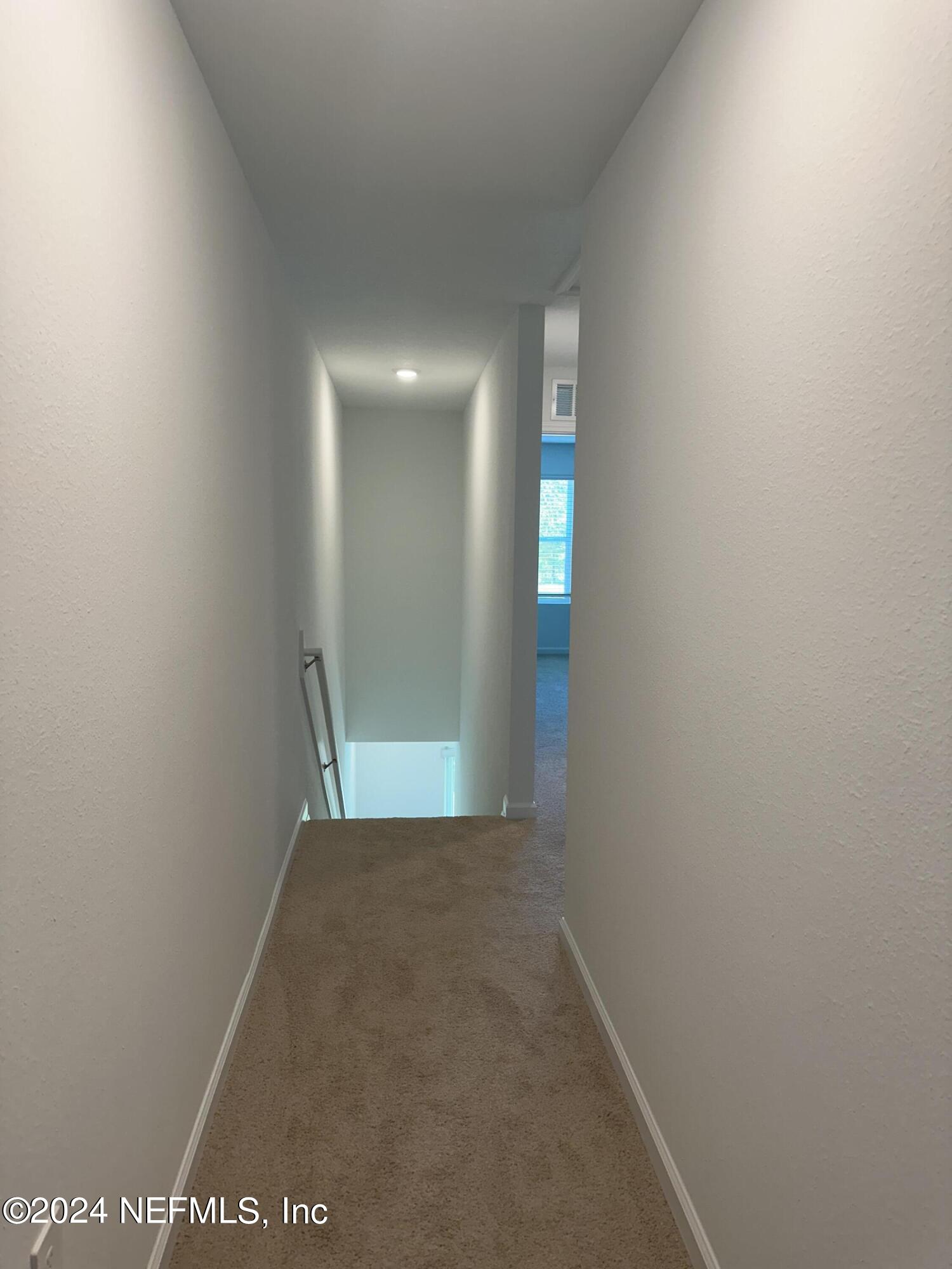 168 Tidal Bch Avenue St. Augustine, FL 32095 - Photo 19 of 36 a view of a big room with an entryway