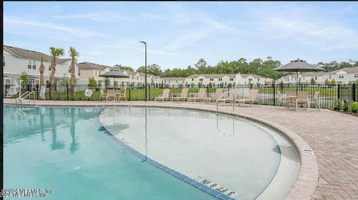 168 Tidal Bch Avenue St. Augustine, FL 32095 - Photo 25 of 36 a view of swimming pool from a balcony