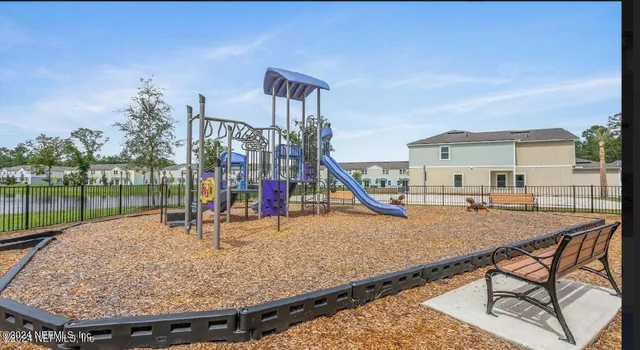 a view of a house with a swimming pool