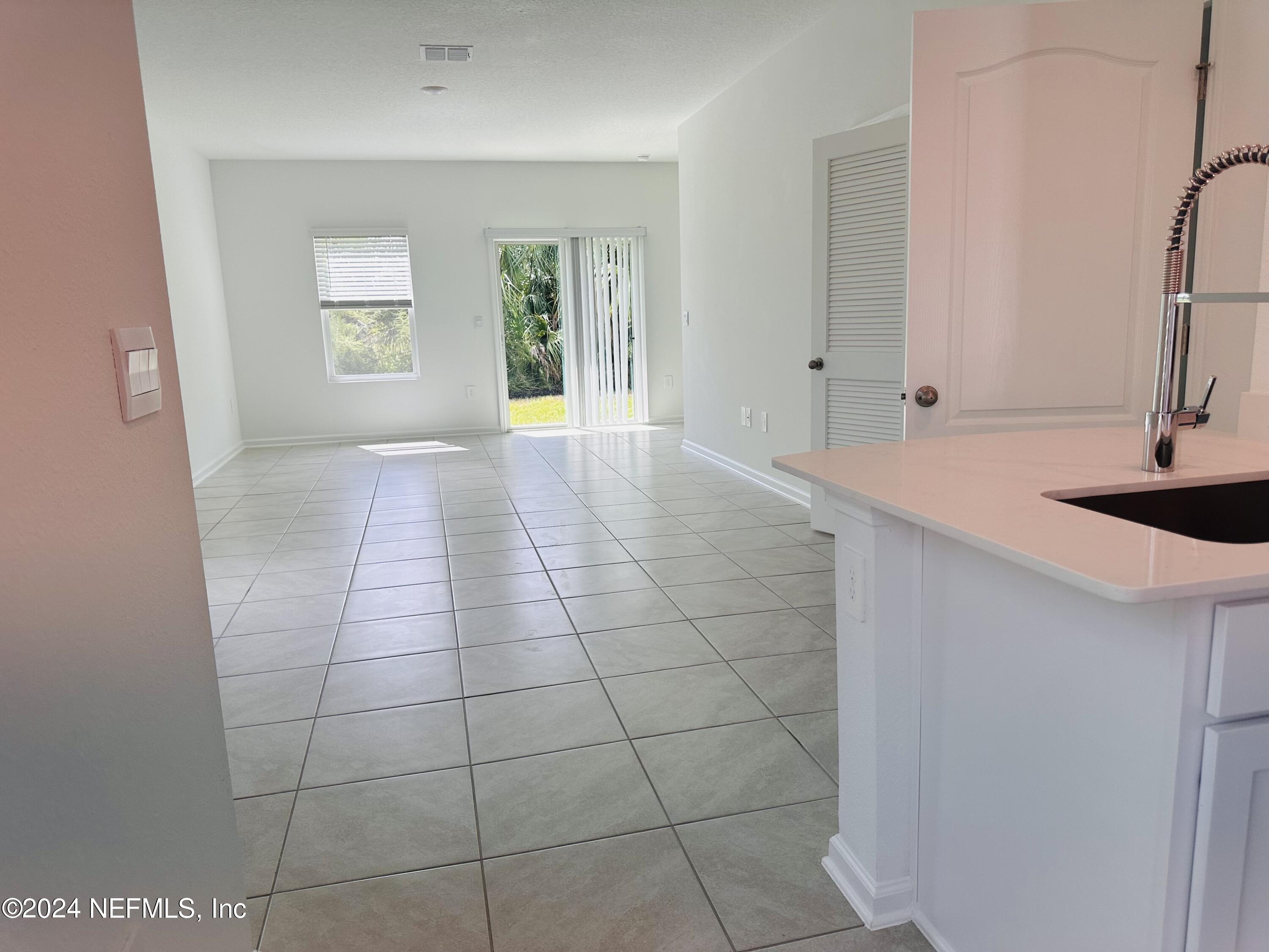 168 Tidal Bch Avenue St. Augustine, FL 32095 - Photo 32 of 36 a view of an empty room and window