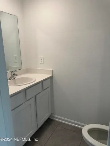 a bathroom with a sink and a vanity