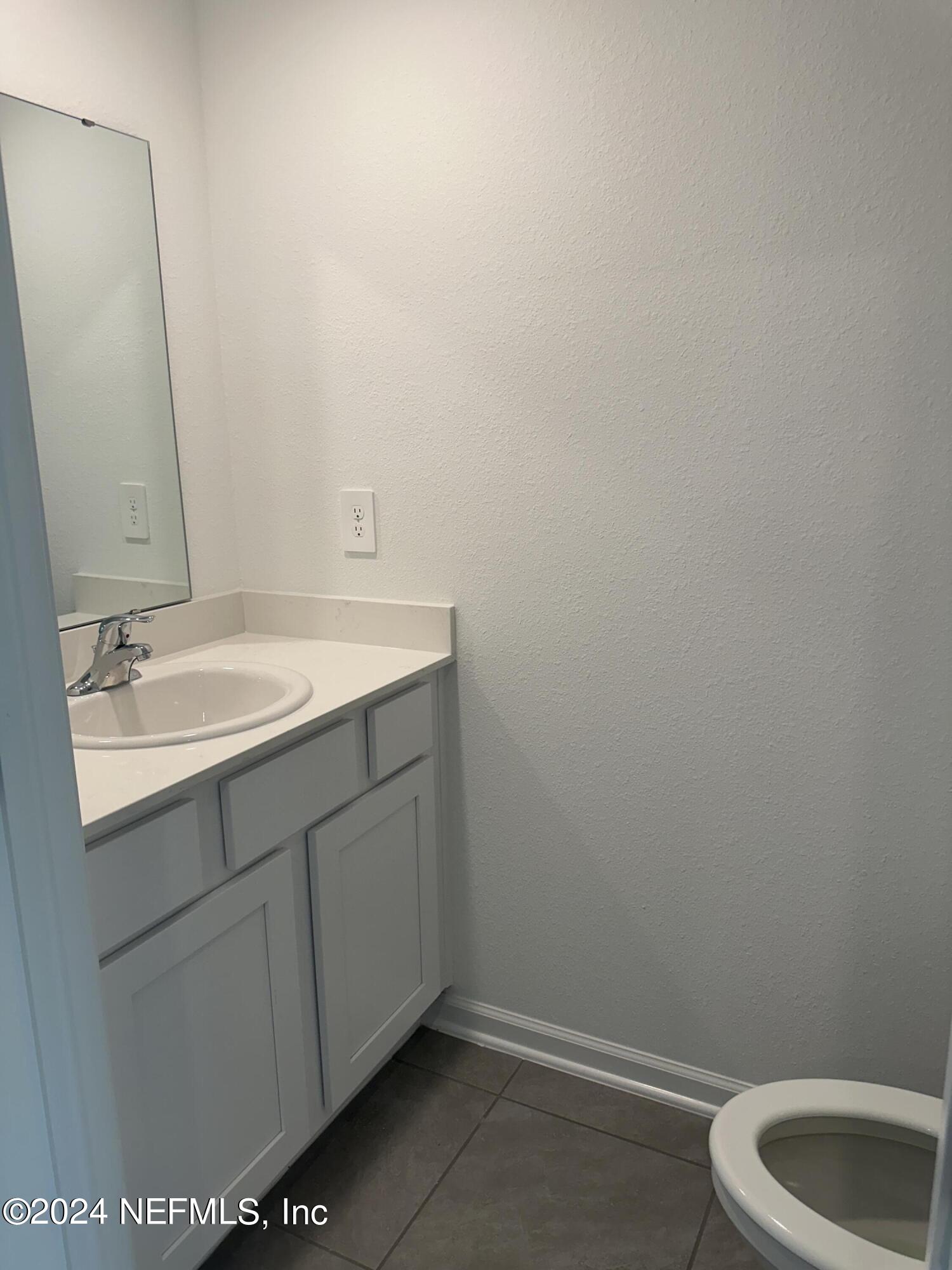 168 Tidal Bch Avenue St. Augustine, FL 32095 - Photo 8 of 36 a bathroom with a sink and a vanity