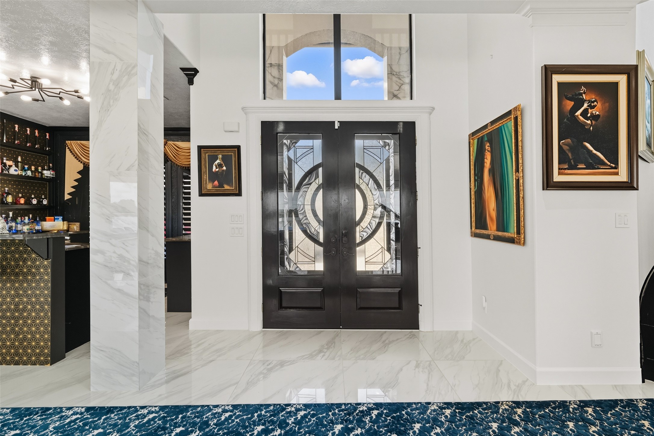 2500 Sand Shore Drive Conroe, TX 77304 - Photo 7 of 50 Gorgeous entrance into this beautiful lake home. Marble flooring throughout with marble accent columns.