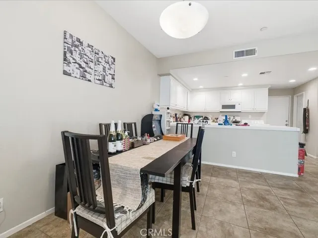 a kitchen with sink and cabinets