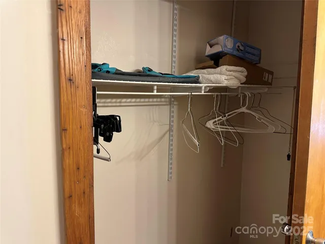 a close view of a utility room with dryer and washer