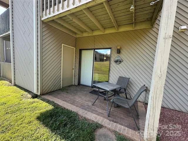 a view of backyard with cabin