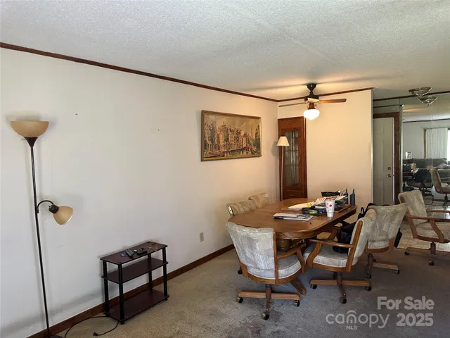 a view of a livingroom with furniture