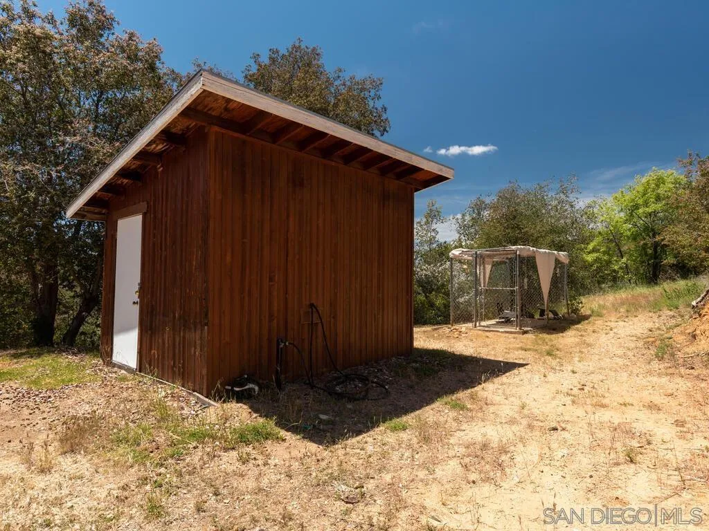 6050 Engineers Road Julian, CA 92036 - Photo 20 of 64 a view of a house with wooden fence