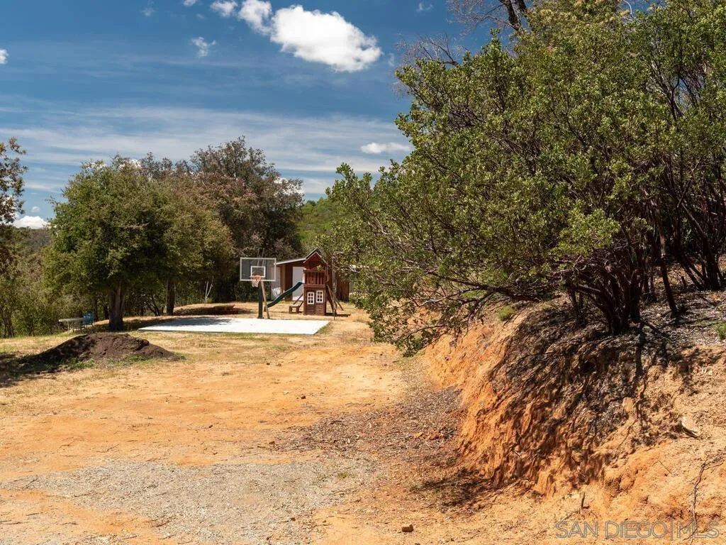 6050 Engineers Road Julian, CA 92036 - Photo 31 of 64 a view of a yard with swimming pool