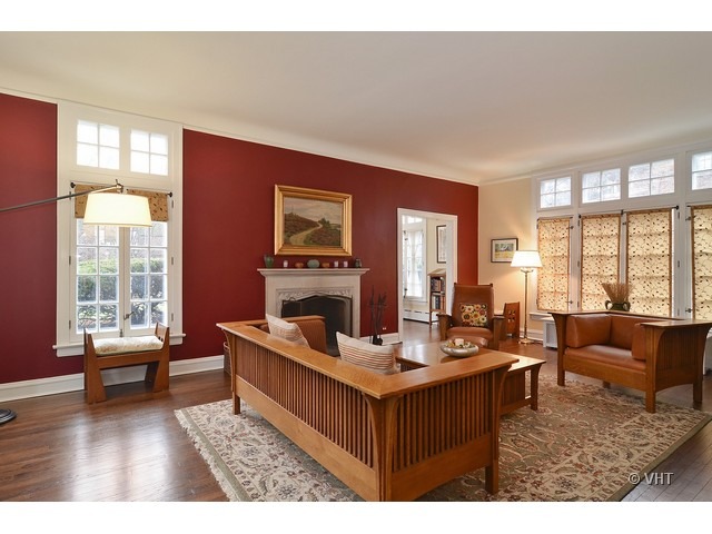 3025 Normandy Place Evanston, IL 60201 - Photo 3 of 24 a living room with furniture and floor to ceiling windows