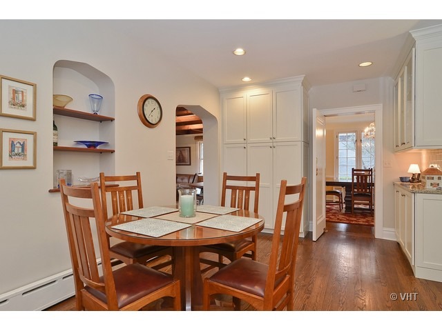 3025 Normandy Place Evanston, IL 60201 - Photo 10 of 24 a view of a dining room with furniture and wooden floor