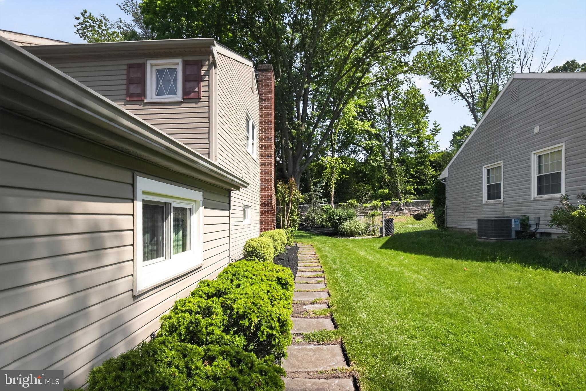 549 Covered Bridge Road Cherry Hill, NJ 08034 - Photo 4 of 16 a front view of a house with a yard