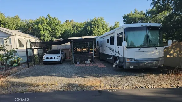 a view of a house with a back yard