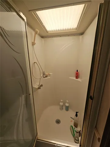 a bed room with furniture and a rug