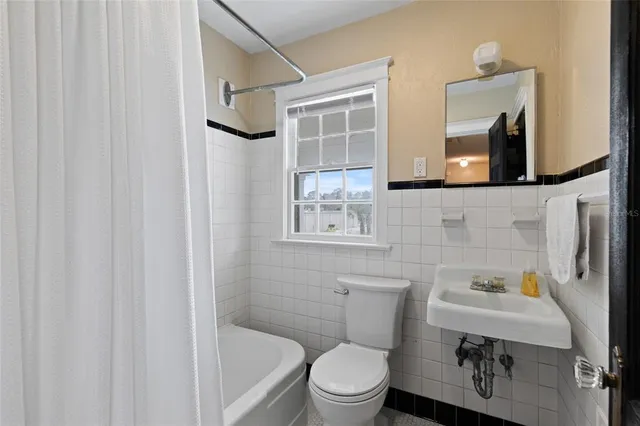 a front view of a building with garden