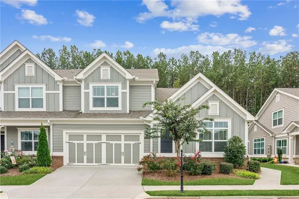 front view of a house with a yard