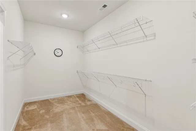 a view of a room with racks on the wall