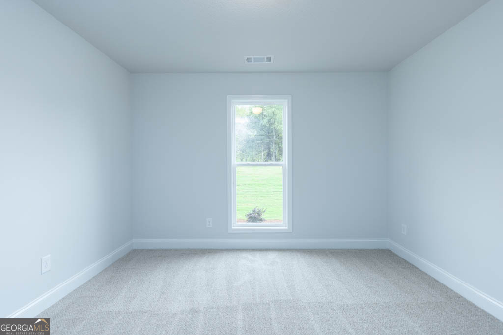 526 Oil Mill Road, Unit 9 Martin, GA 30557 - Photo 14 of 27 an empty room with a window
