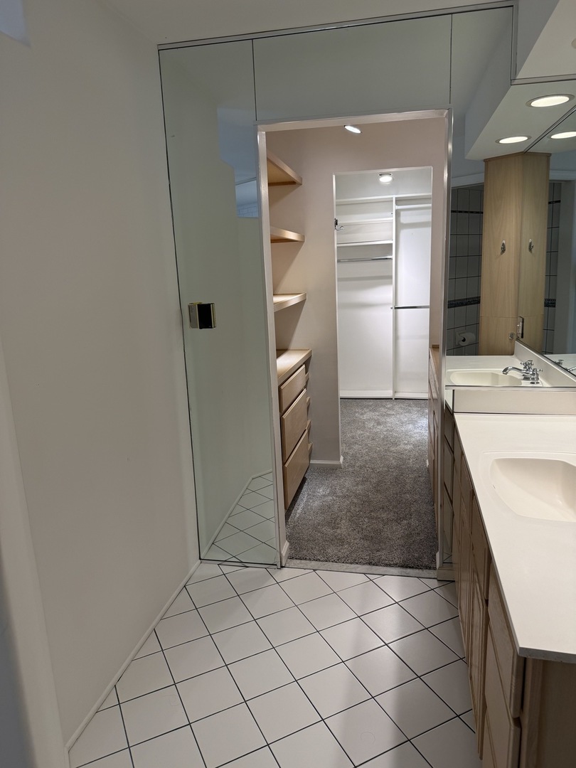 414 South Dee Road Park Ridge, IL 60068 - Photo 19 of 37 a room with a refrigerator and cabinets