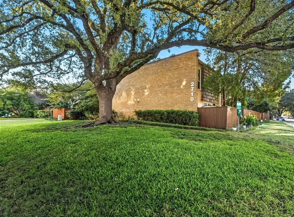 2702 Douglas Avenue, Unit 121 Dallas, TX 75219 - Photo 2 of 34 a view of a back yard
