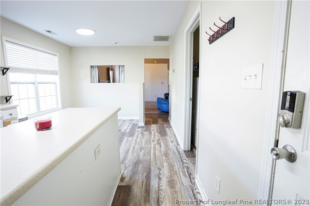 10 Pender Road Spring Lake, NC 28390 - Photo 14 of 30 a view of a living room with a wooden floor