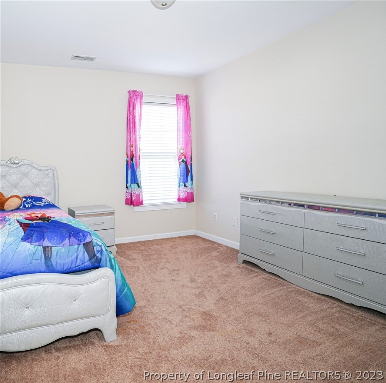 10 Pender Road Spring Lake, NC 28390 - Photo 19 of 30 a living room with furniture and a window