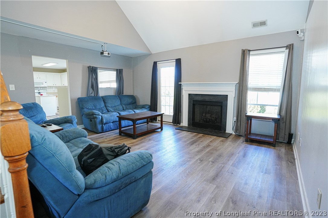 10 Pender Road Spring Lake, NC 28390 - Photo 3 of 30 a living room with furniture and a fireplace