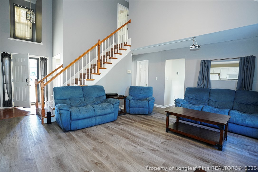 10 Pender Road Spring Lake, NC 28390 - Photo 4 of 30 a living room with furniture and wooden floor