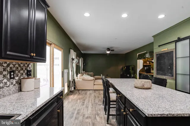 a kitchen with granite countertop lots of counter top space