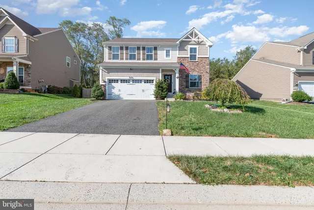 a front view of house with yard
