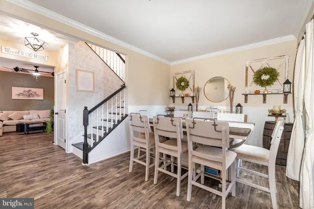 a view of a livingroom with furniture and a window