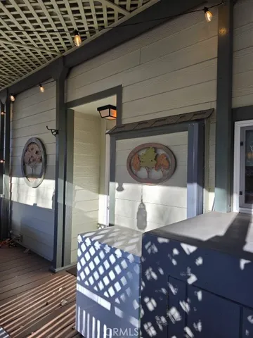 a view of living room kitchen and a wooden floor