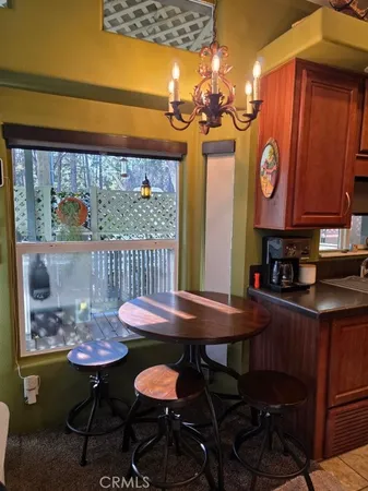 a view of a table and chairs in a room