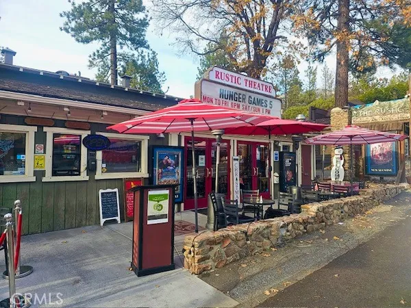 a view of street with parked cars
