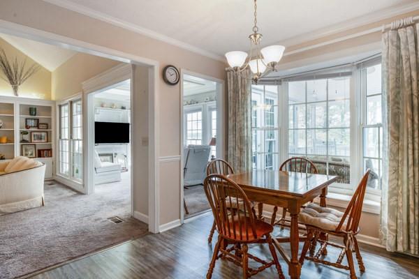 167 Edgewater Drive Temple, GA 30179 - Photo 5 of 37 a view of a dining room with furniture window and wooden floor