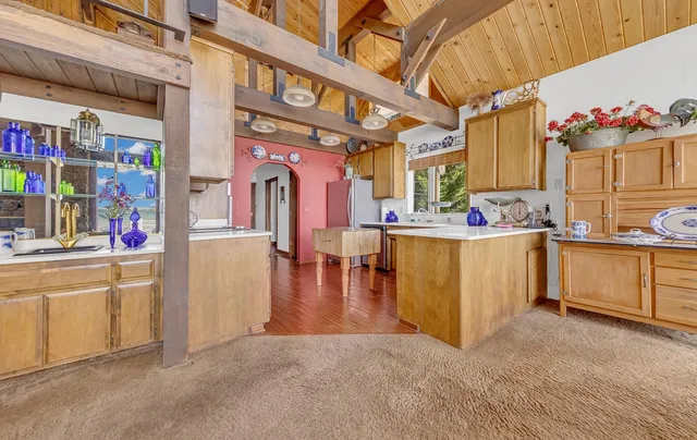 a bedroom with a bed and a desk