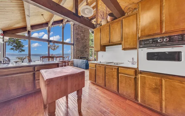 a bathroom with a tub and a shower