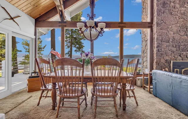 a bedroom with a bed and a dresser in it