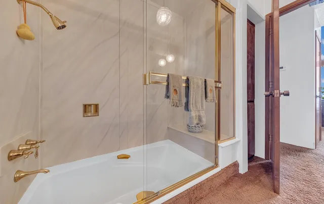 a view of a chairs and table in the patio