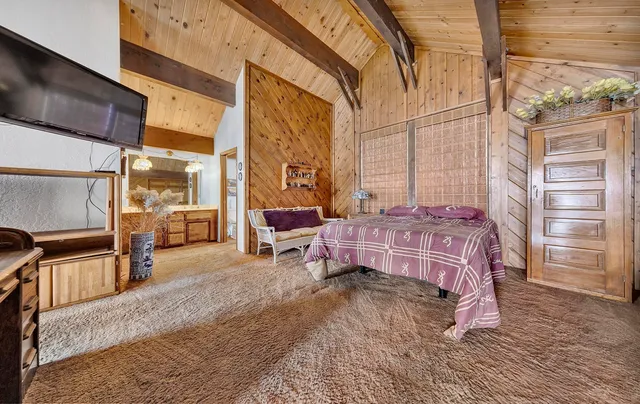 a view of a swimming pool with a lounge chair