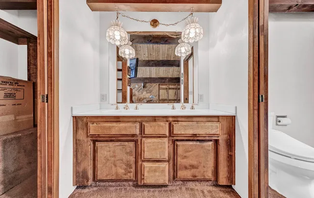 a house that has a tree in front of the house