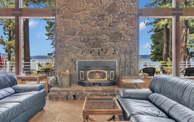 a view of a kitchen with refrigerator and a stove