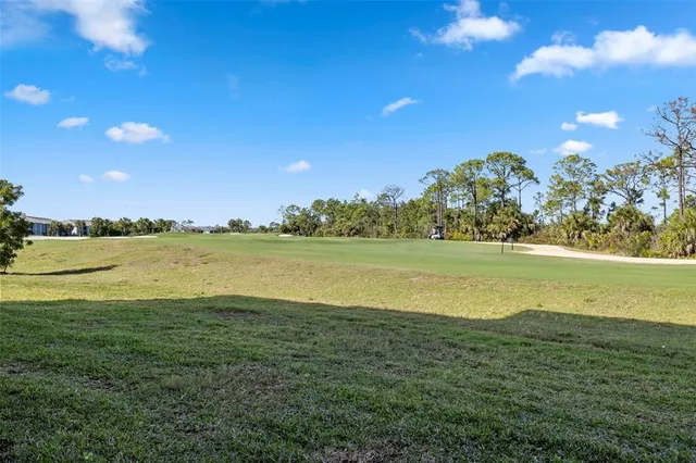 a view of an ocean and a mountain