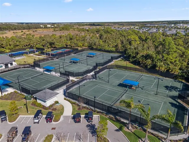an aerial view of a house with a lake view